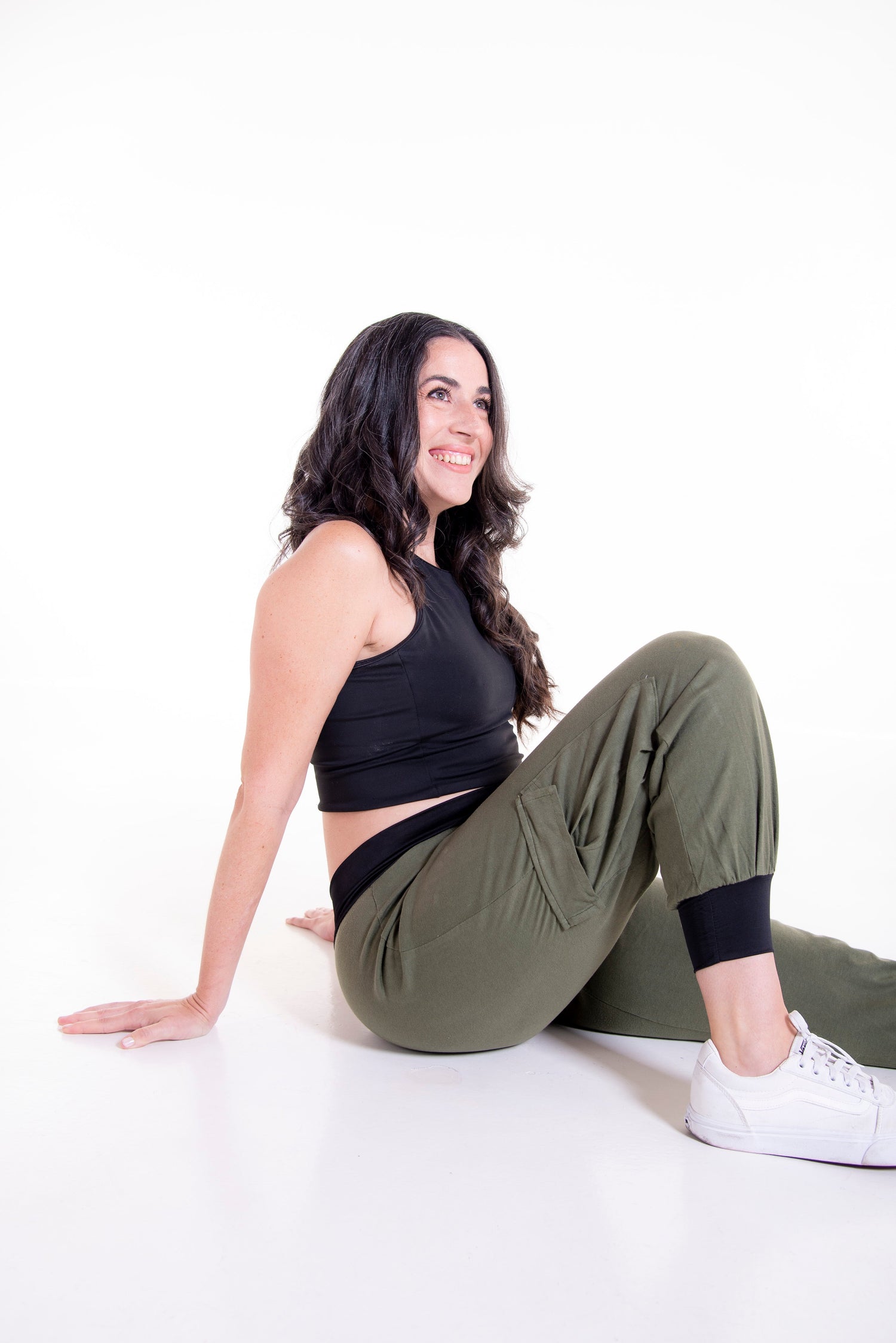 Woman wearing olive green pants from pants and shorts sewing patterns collection by The Bobbin Bloom