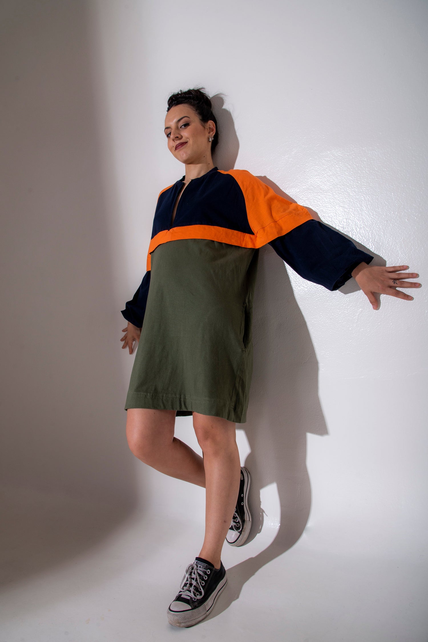 Woman wearing colorblock hoodie dress from hoodies and sweatshirts sewing patterns collection by The Bobbin Bloom