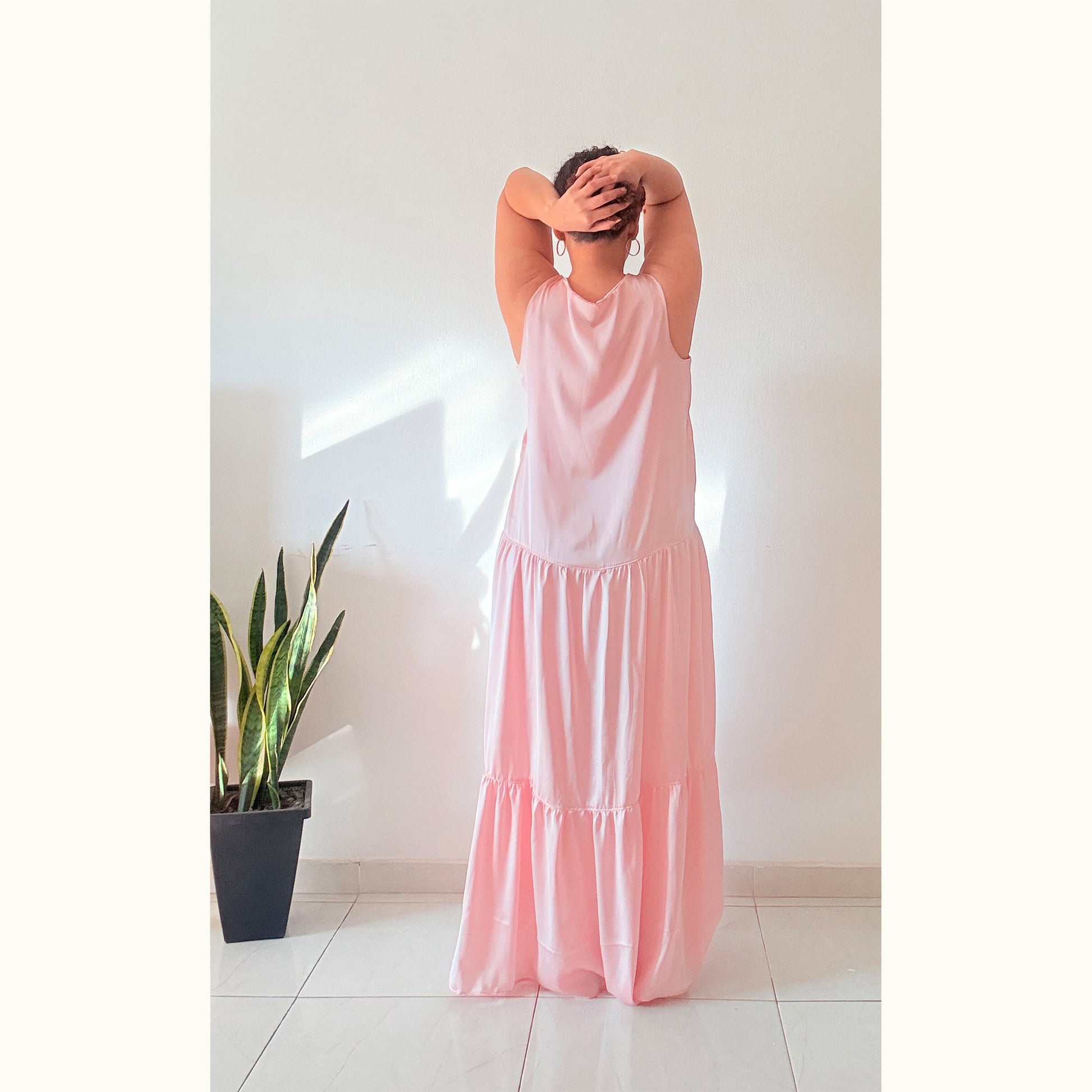 Back view of pink Blossom Tank maxi dress showing tiered skirt details