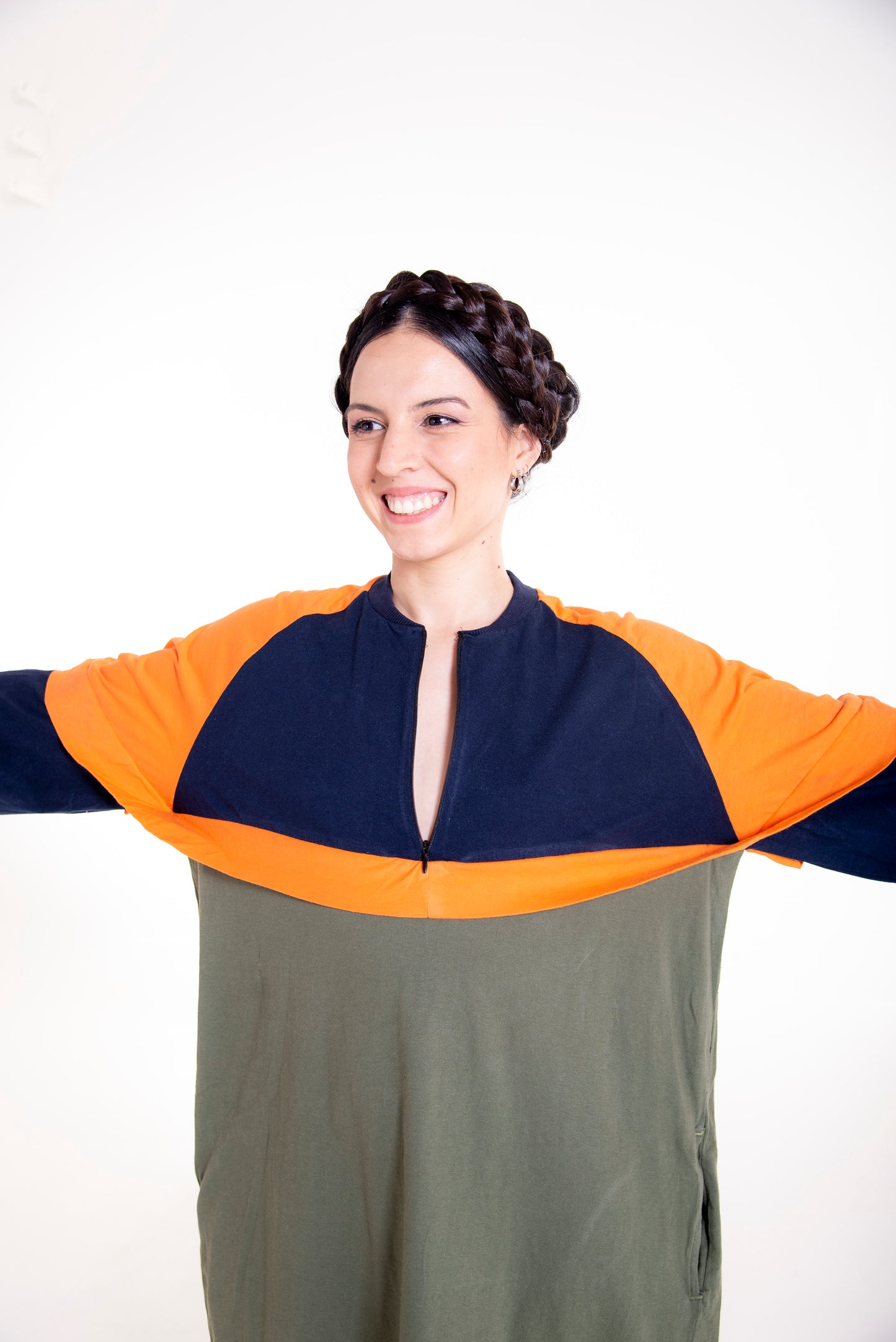 Dahlia raglan dress showing raglan sleeve detail, front zipper and colorblock desig