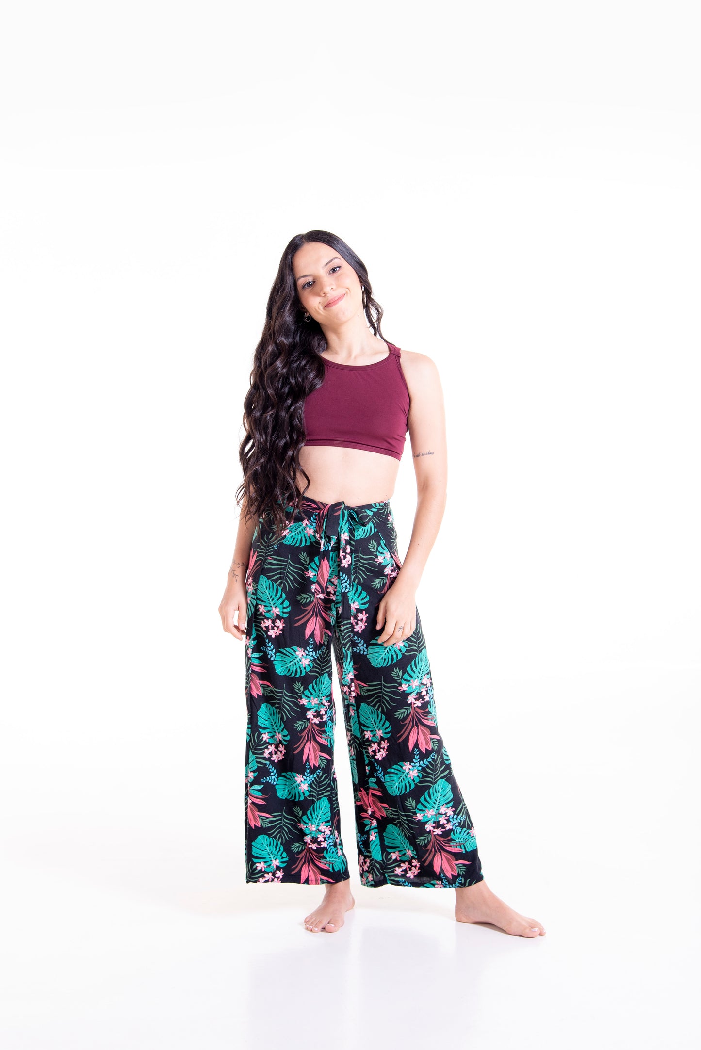 Front view of floral print Ivy wrap pants - full length styling