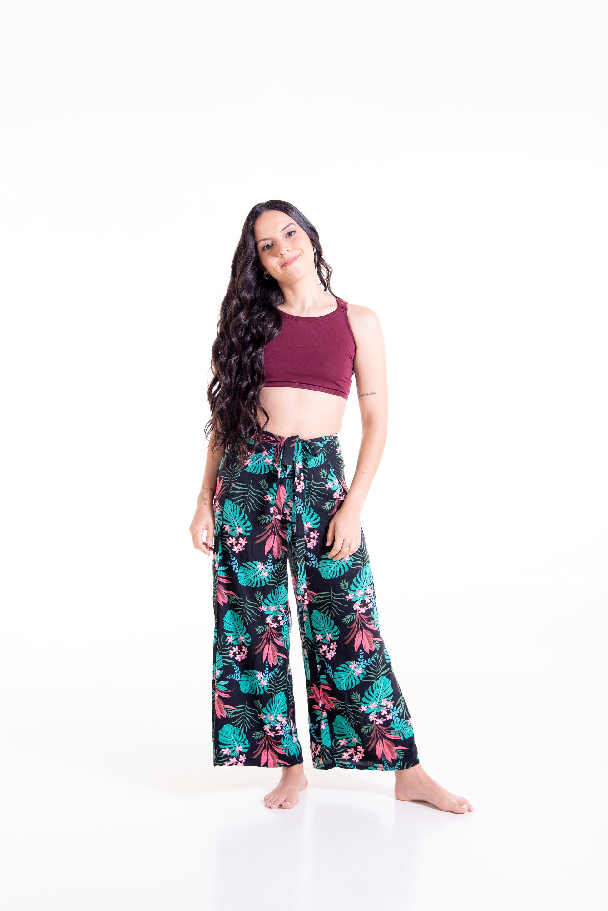 Front view of floral print Ivy wrap pants - full length styling
